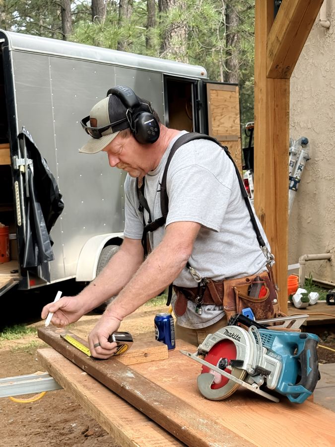 Before: Chip marking a board beside the circular saw