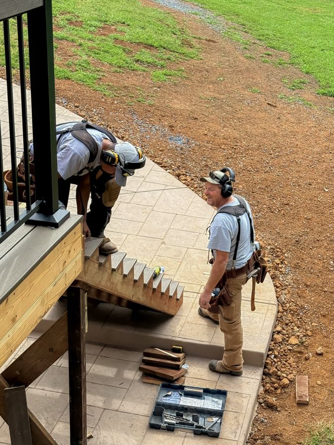 Chip watching the crew build stairs